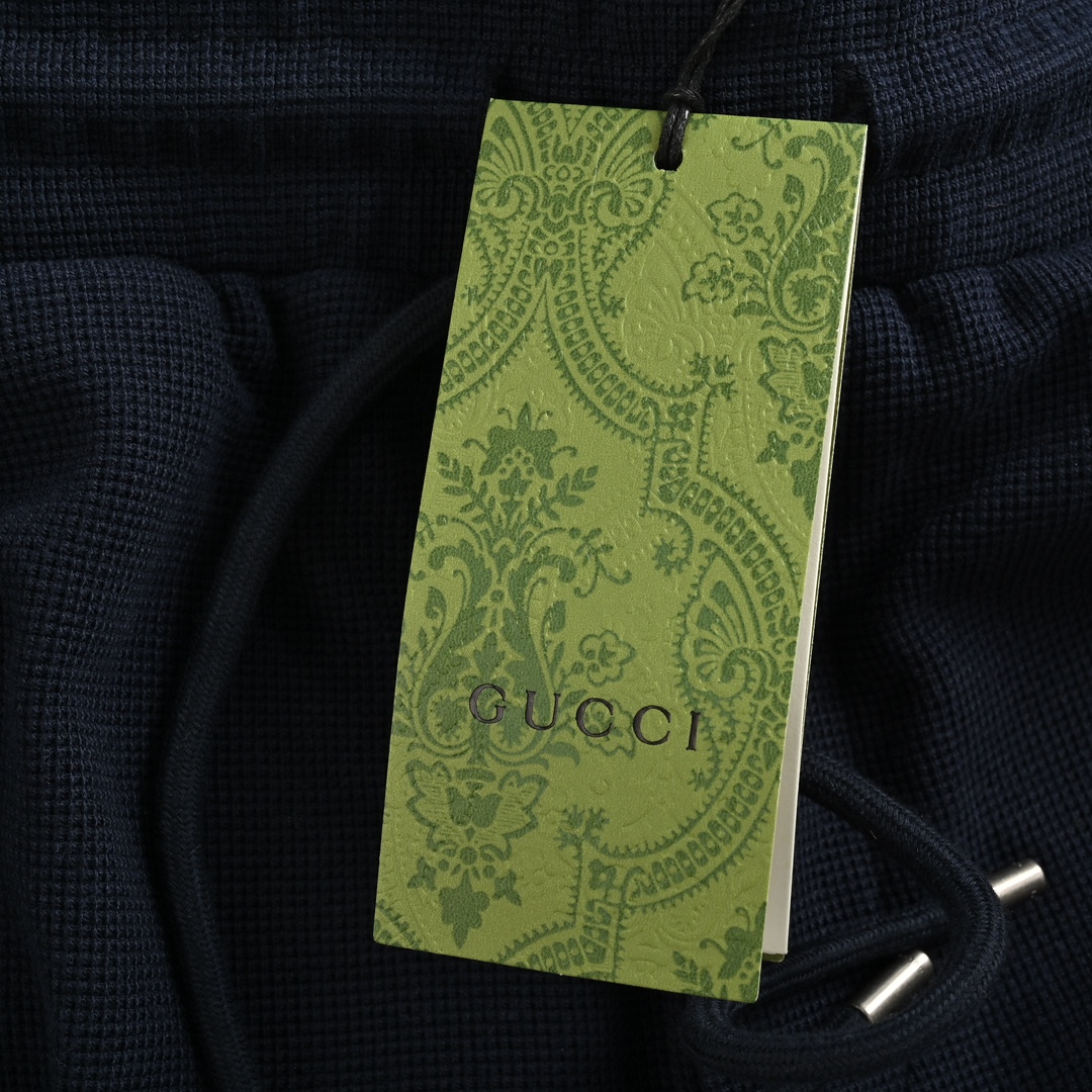 Gucci 24Fw embroidered logo paneled cuffed trousers