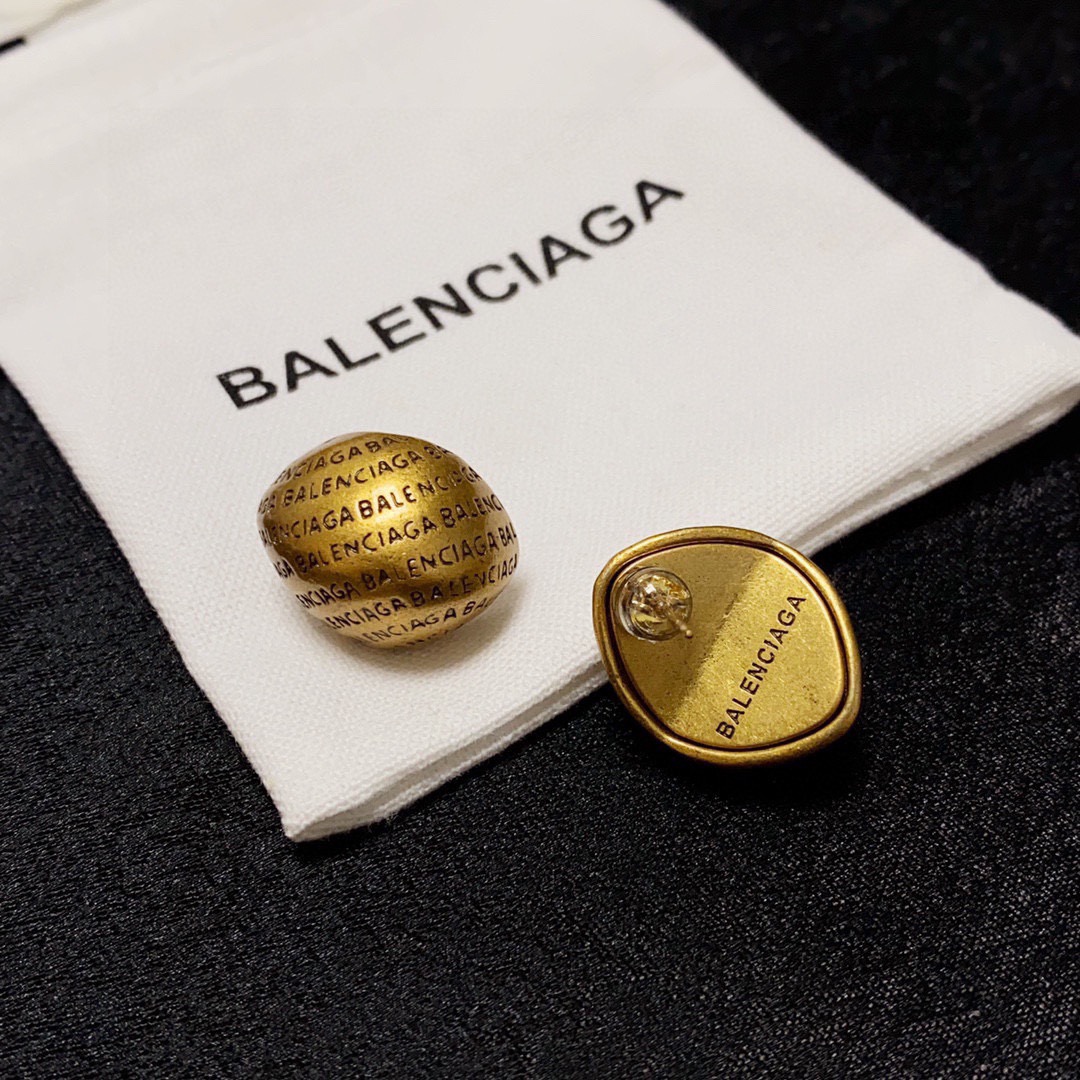 Balenciaga antique gold engraved letter earrings