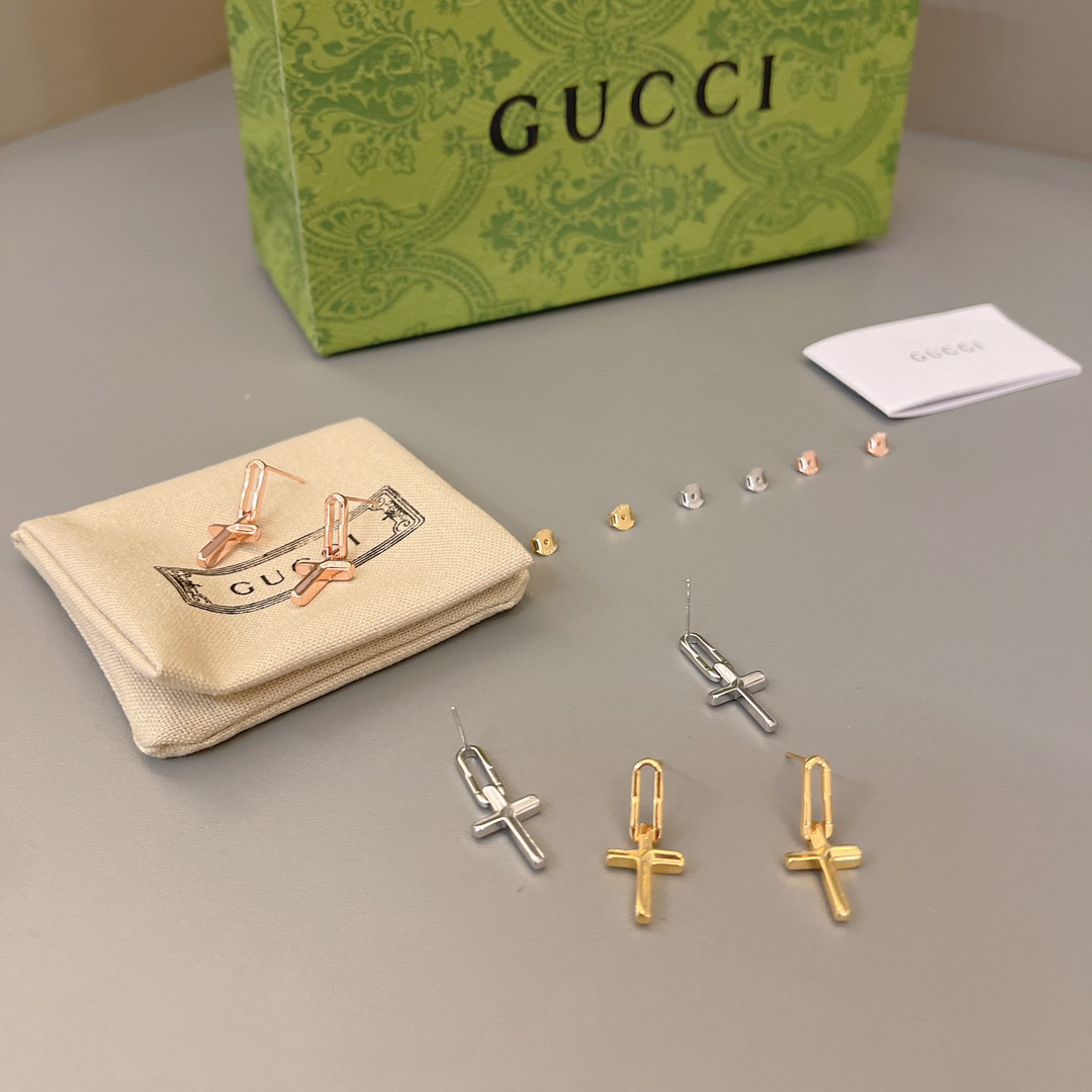 GUCCi cross earrings
