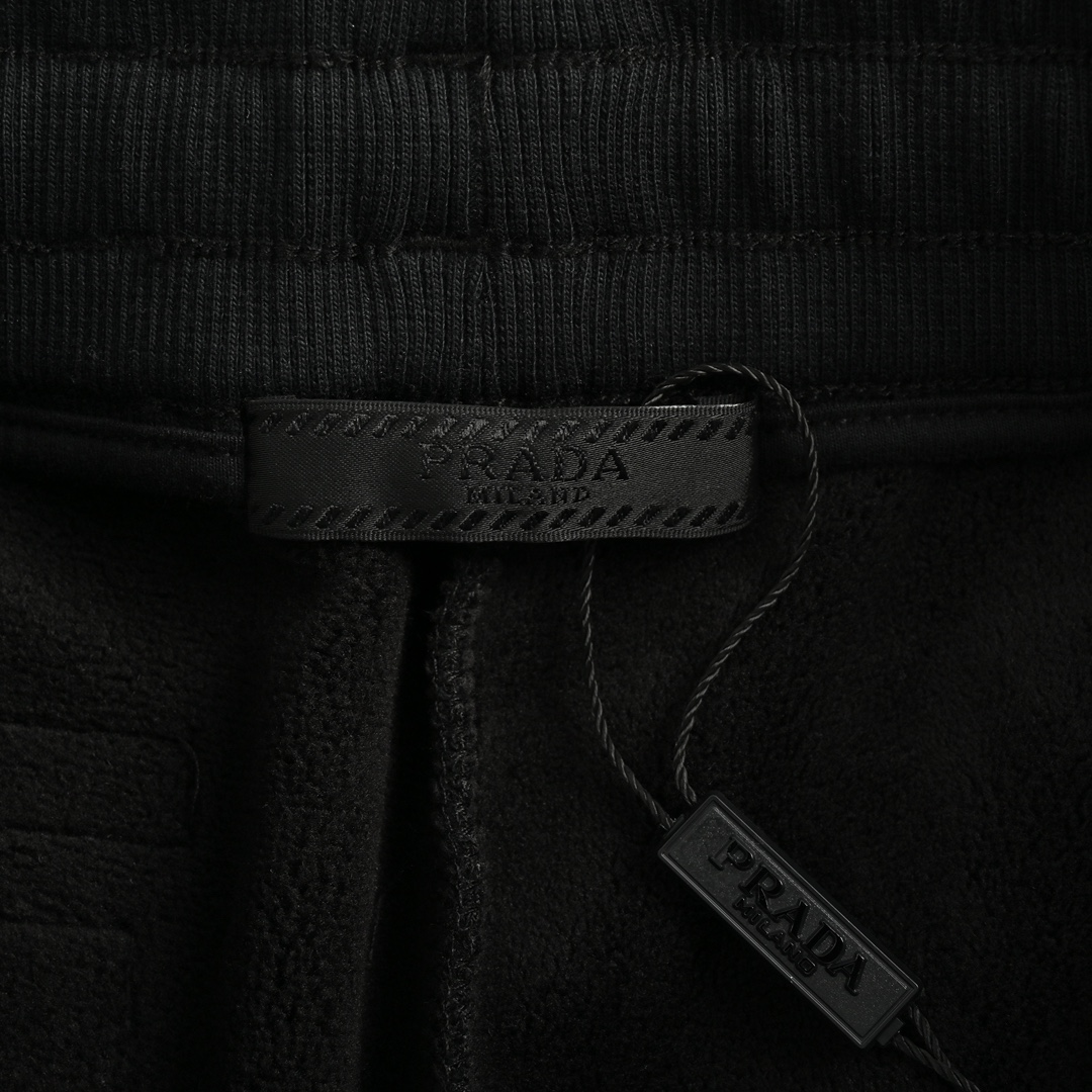 Prada 24Fw embroidered metal triangle logo laminated pockets fleece trousers