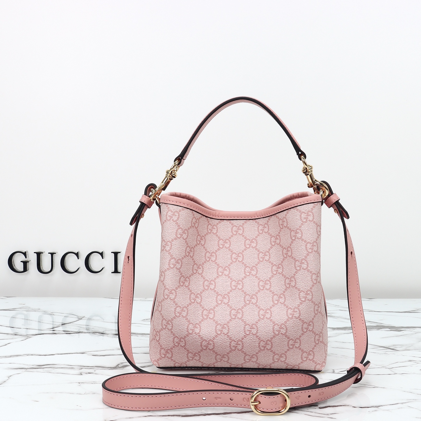 Gucci GG Emblem small bucket bag ‎815118 FAD6L 8459