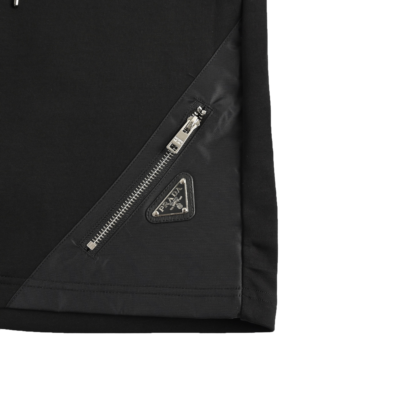 Prada 25ss triangle hem nylon patchwork pocket shorts