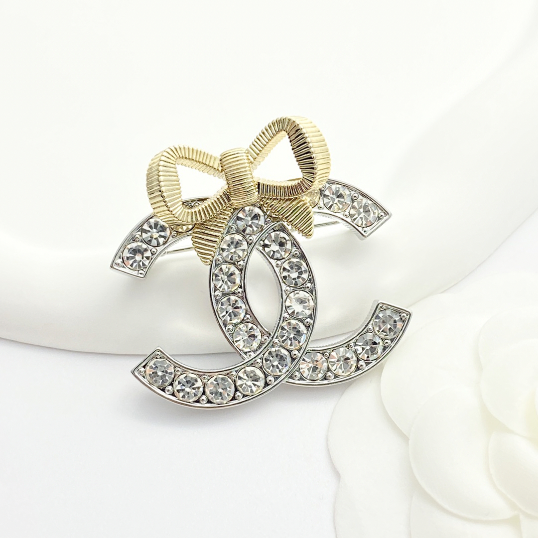 CHAN 24 gold and silver three-dimensional bow brooch