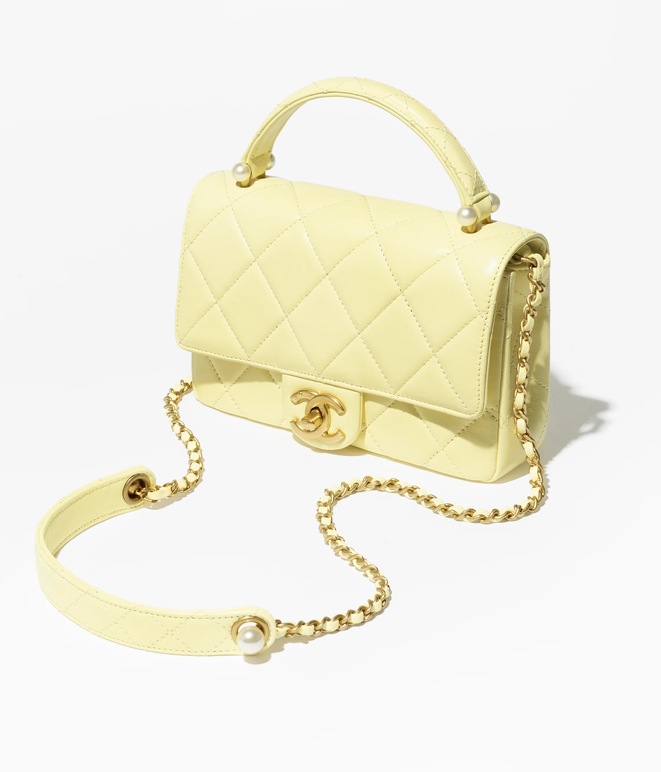 Chanel Mini Flap Bag with Top Handle Shiny Lambskin, Imitation Pearls & Gold-Tone Metal Light Yellow AS5399-B19655-NAAUK