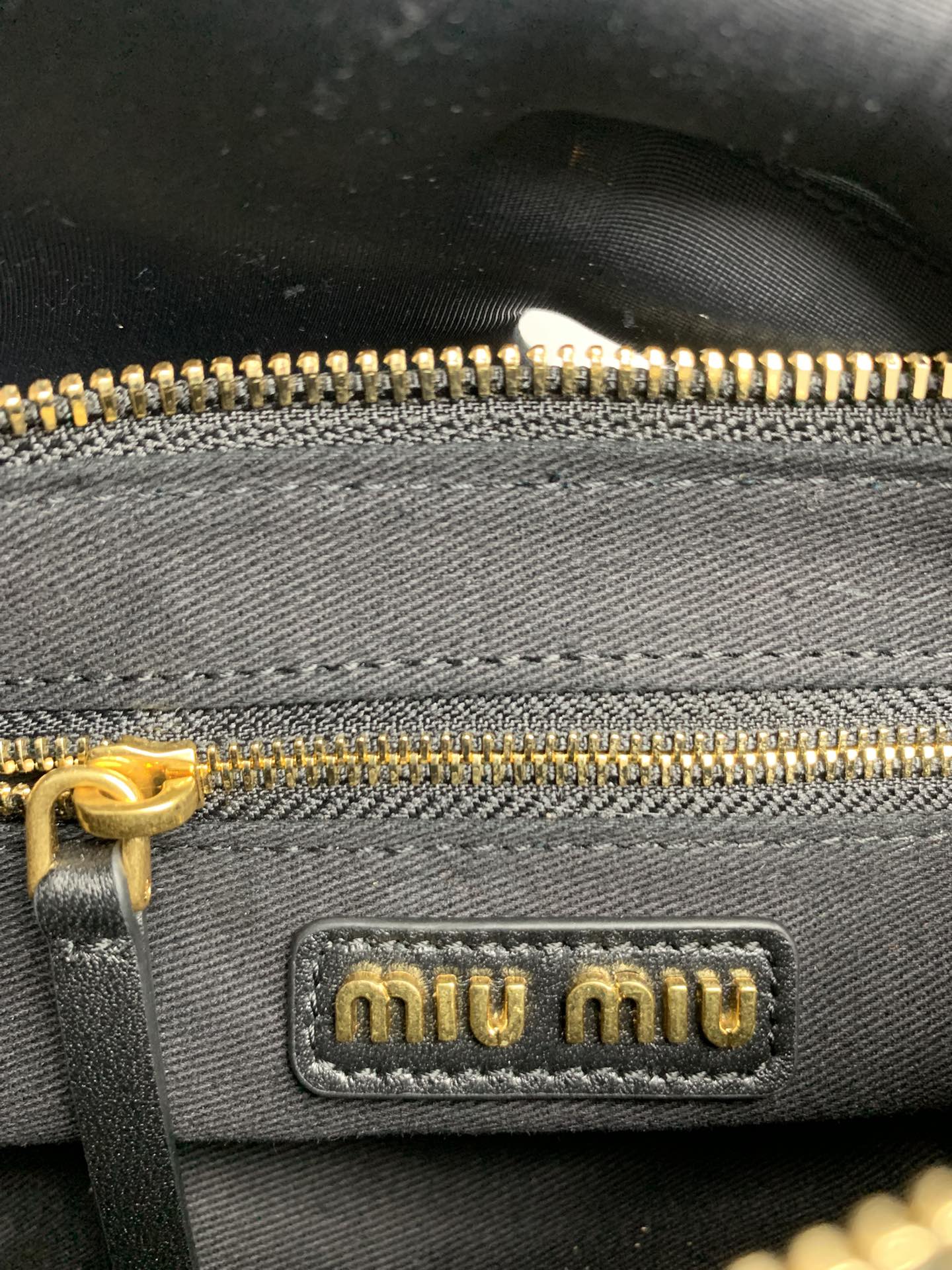 Miu Miu Multi-Pocket Biker Bag