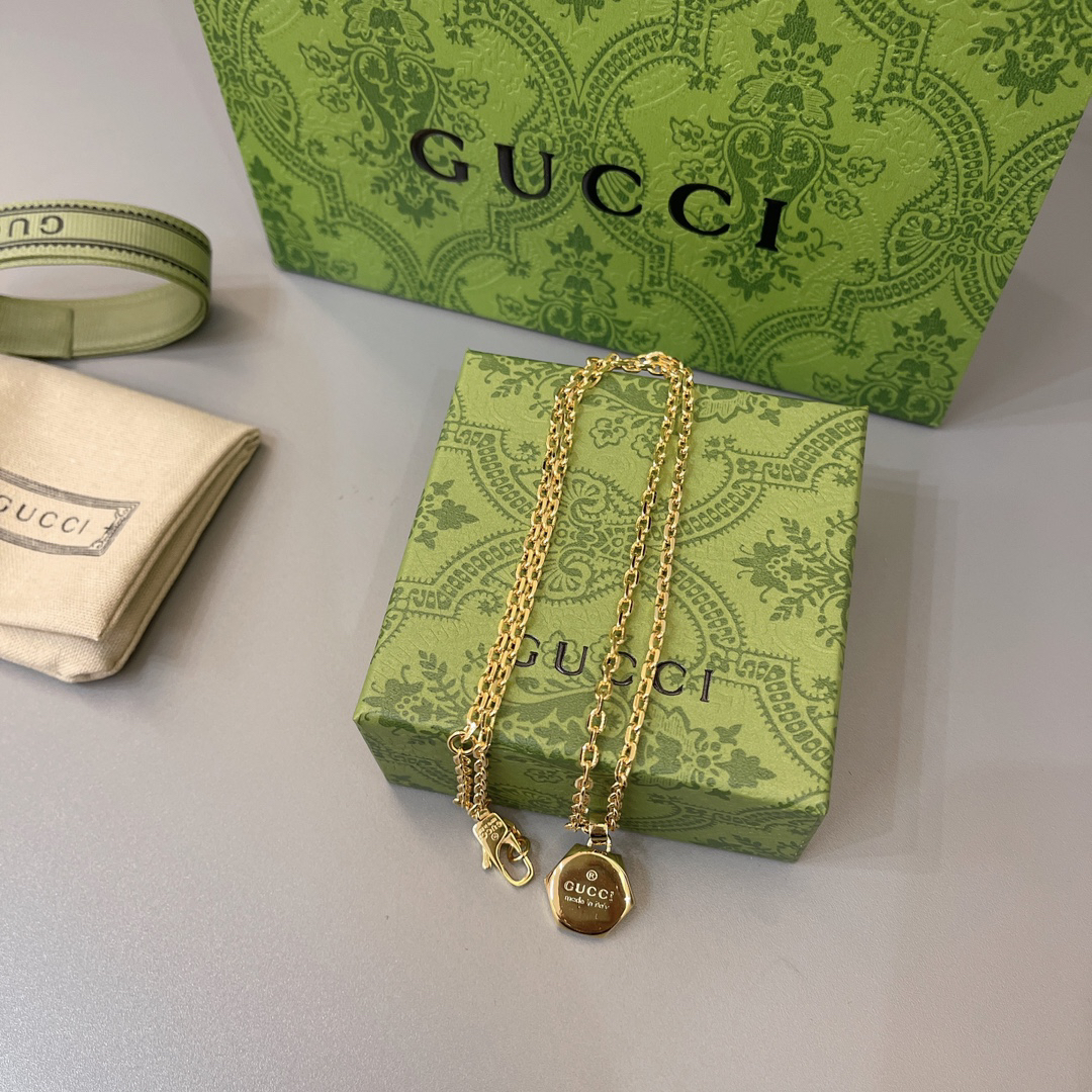 Gucci gold nut necklace