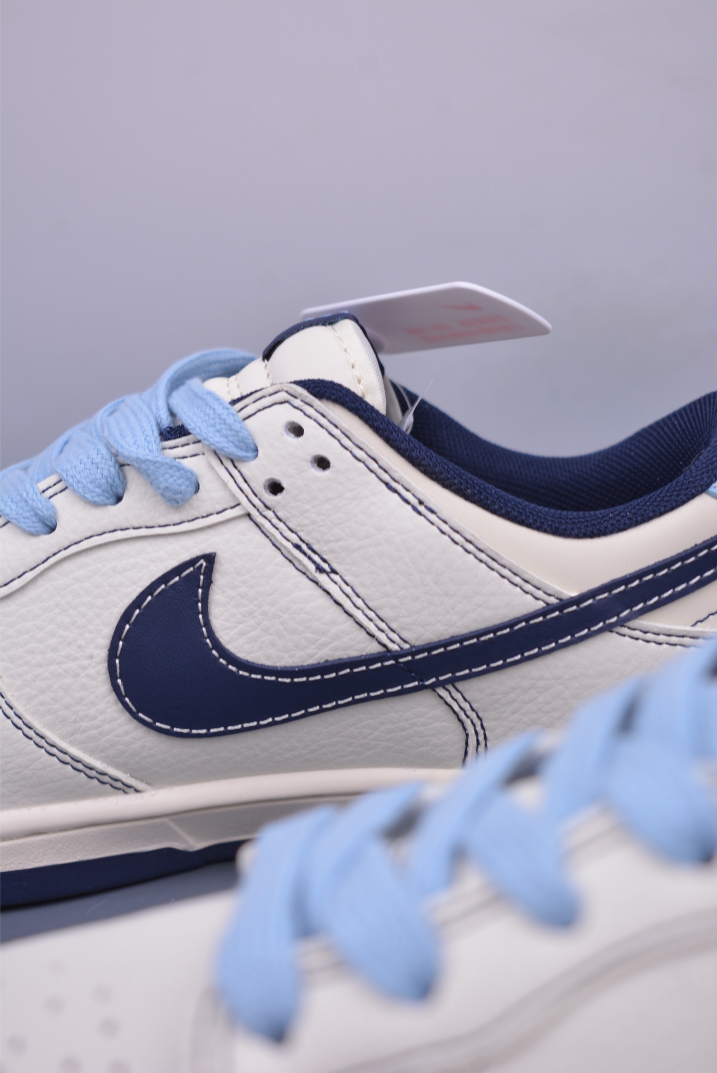 BAPE x Nike SB Dunk Low Low-top Sneakers Off-White and Black BZ2501-100