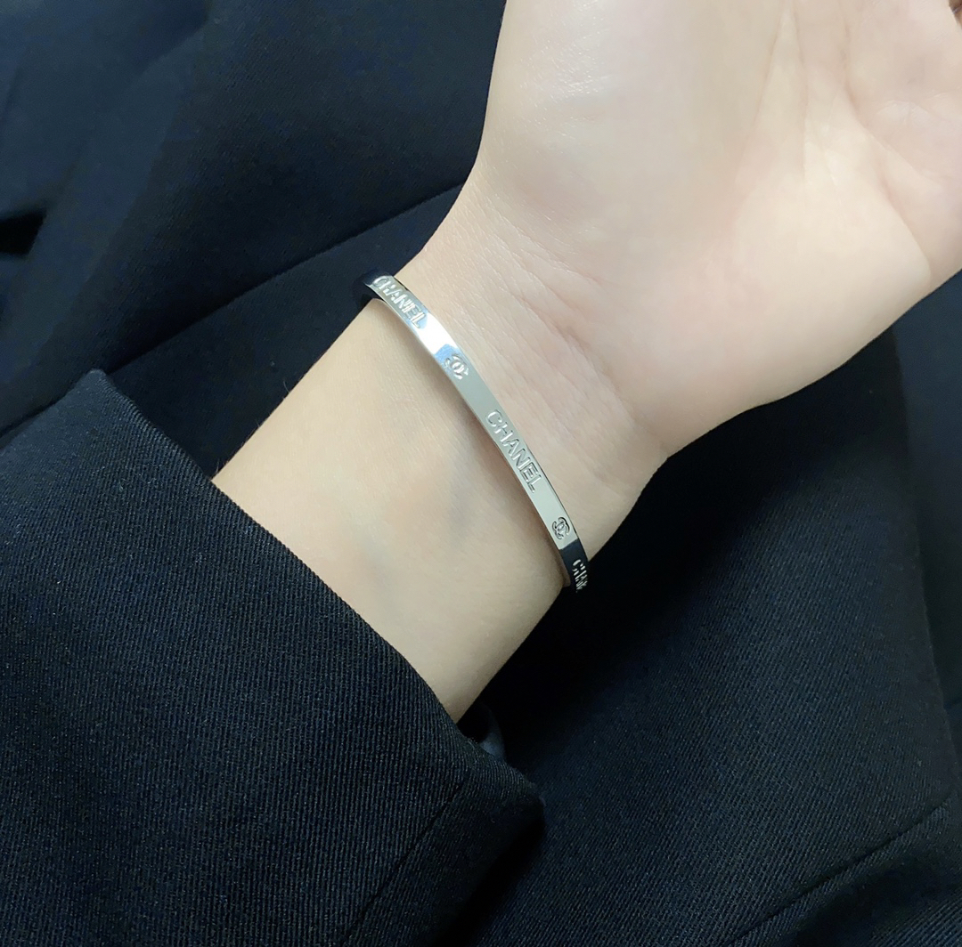 Chanel narrow engraved letter bracelet