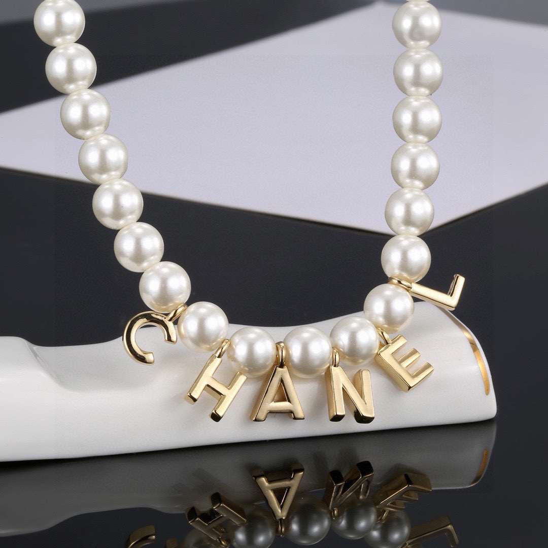 Chanel alphabet pearl necklace