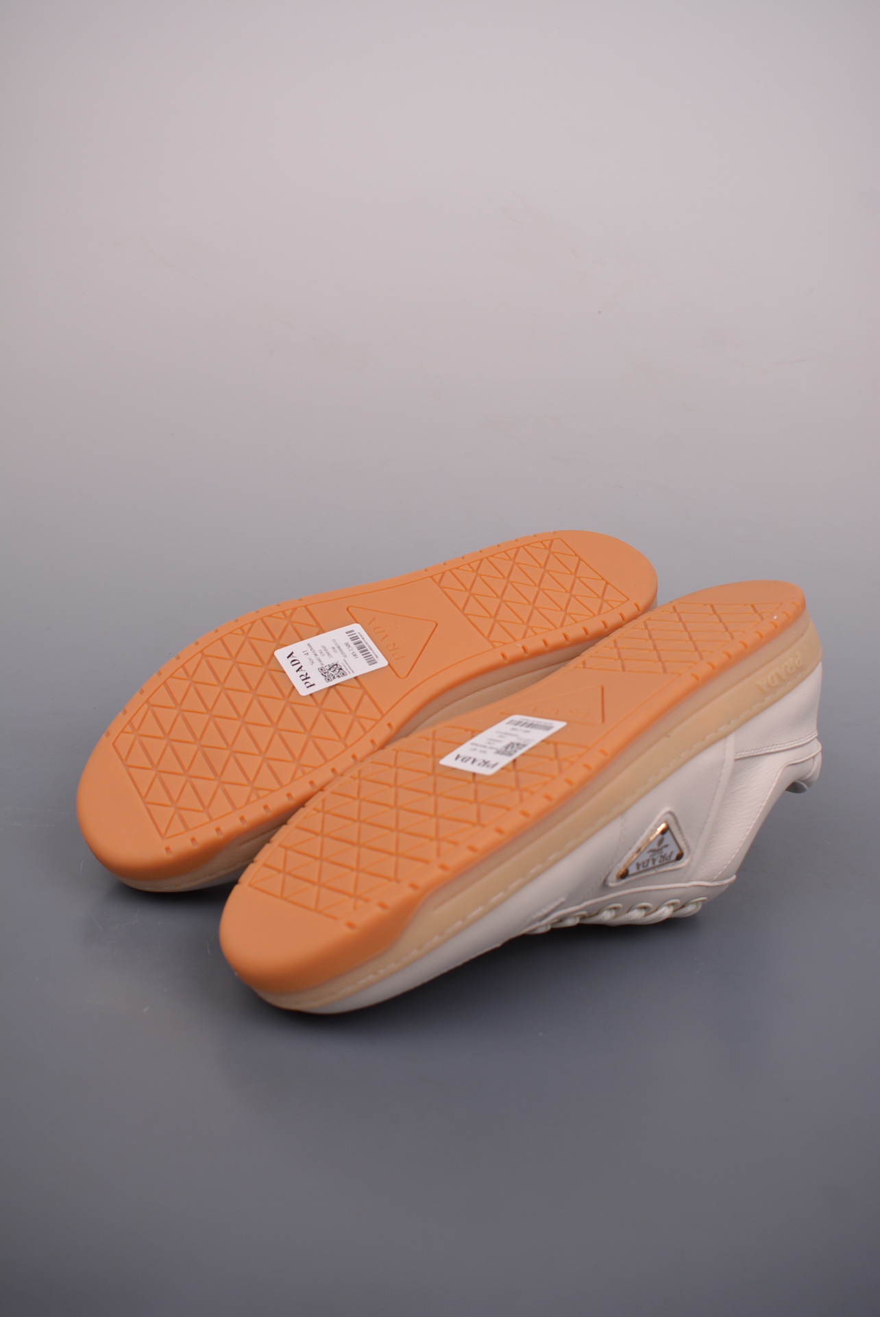 Prada Downtown Low Sneakers off-white