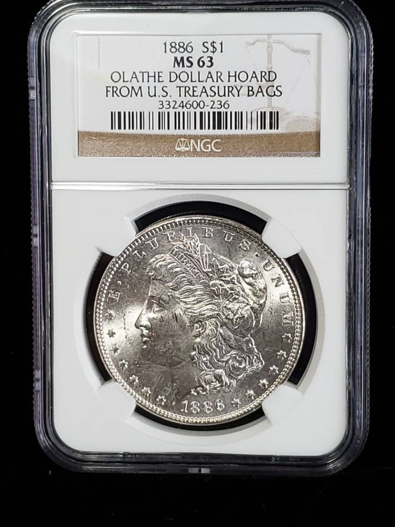1886  MS 63 Silver Morgan Dollar, NGC  MS 63  Silver  Coin . Olathe Dollar Hoard - From the U.S Treasury Bags !    Lot # 1494