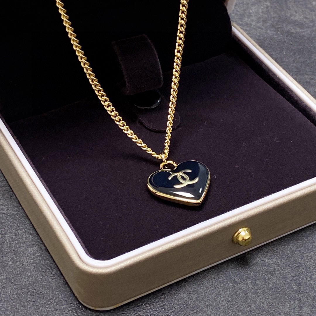 Chanel black heart double-sided necklace