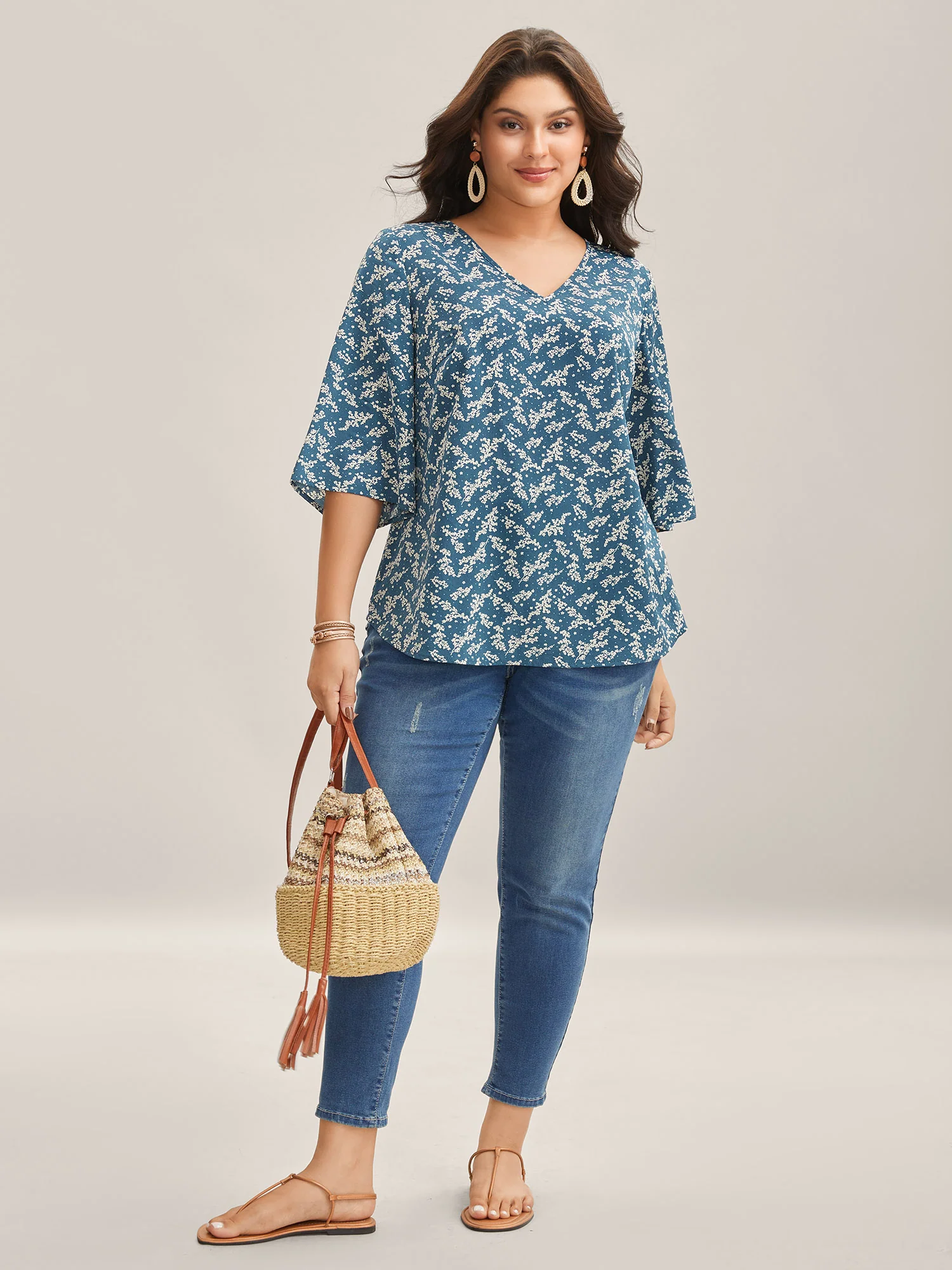 Floral Print Curvy Hem V-Neck Shirt