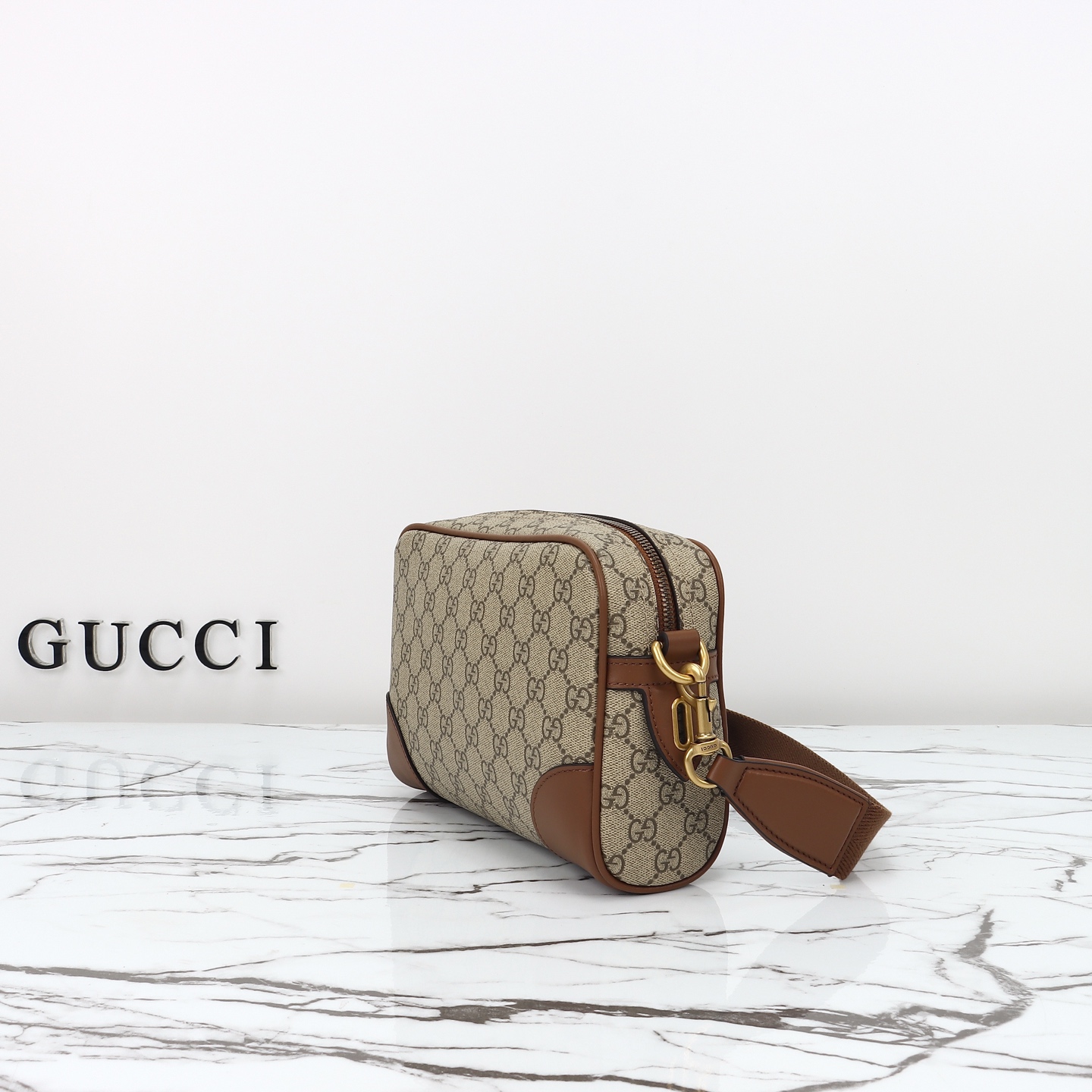 Gucci GG Emblem small crossbody bag 821155