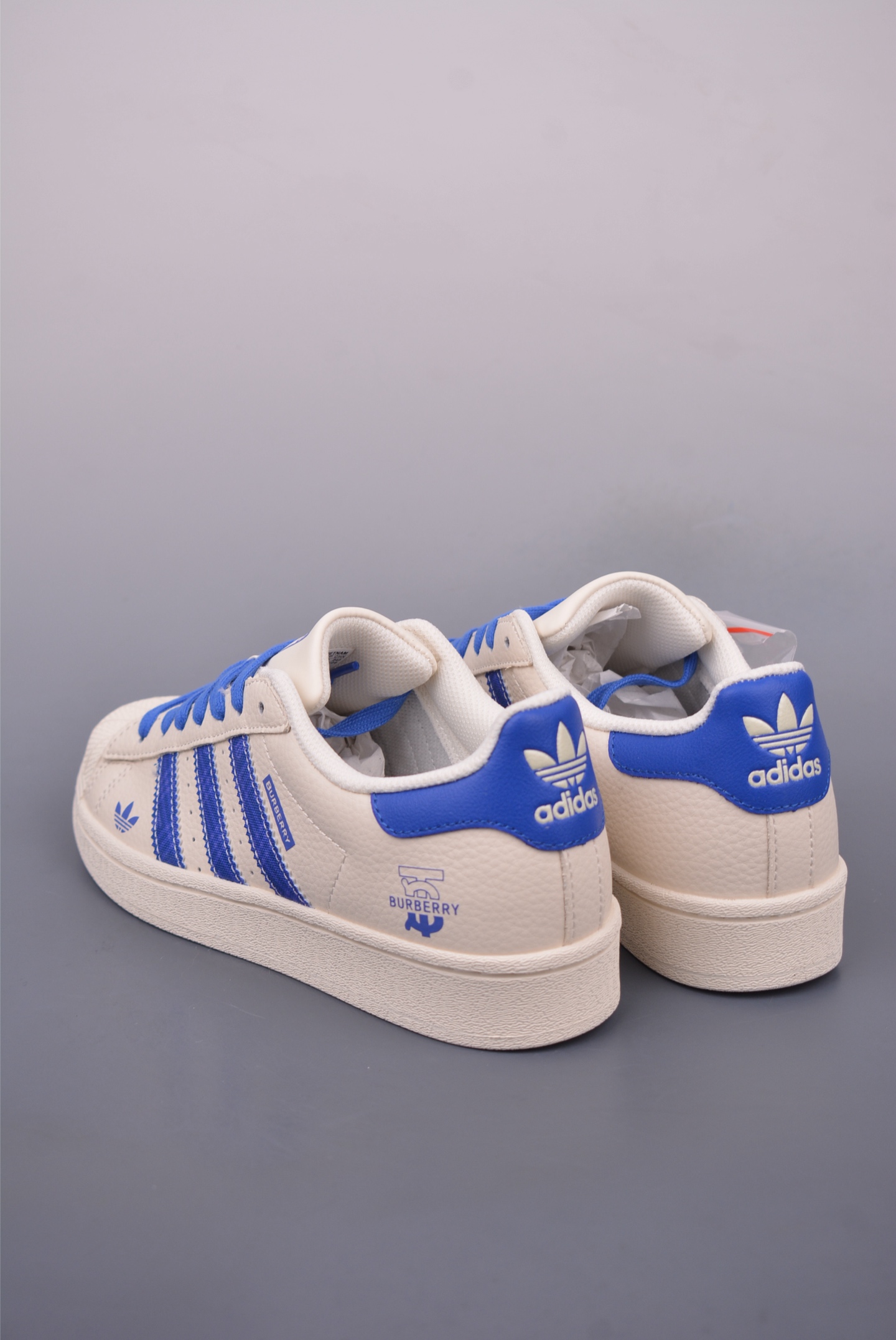 Burberry x Adidas Originals Superstar sneakers Off-white and blue AD0002