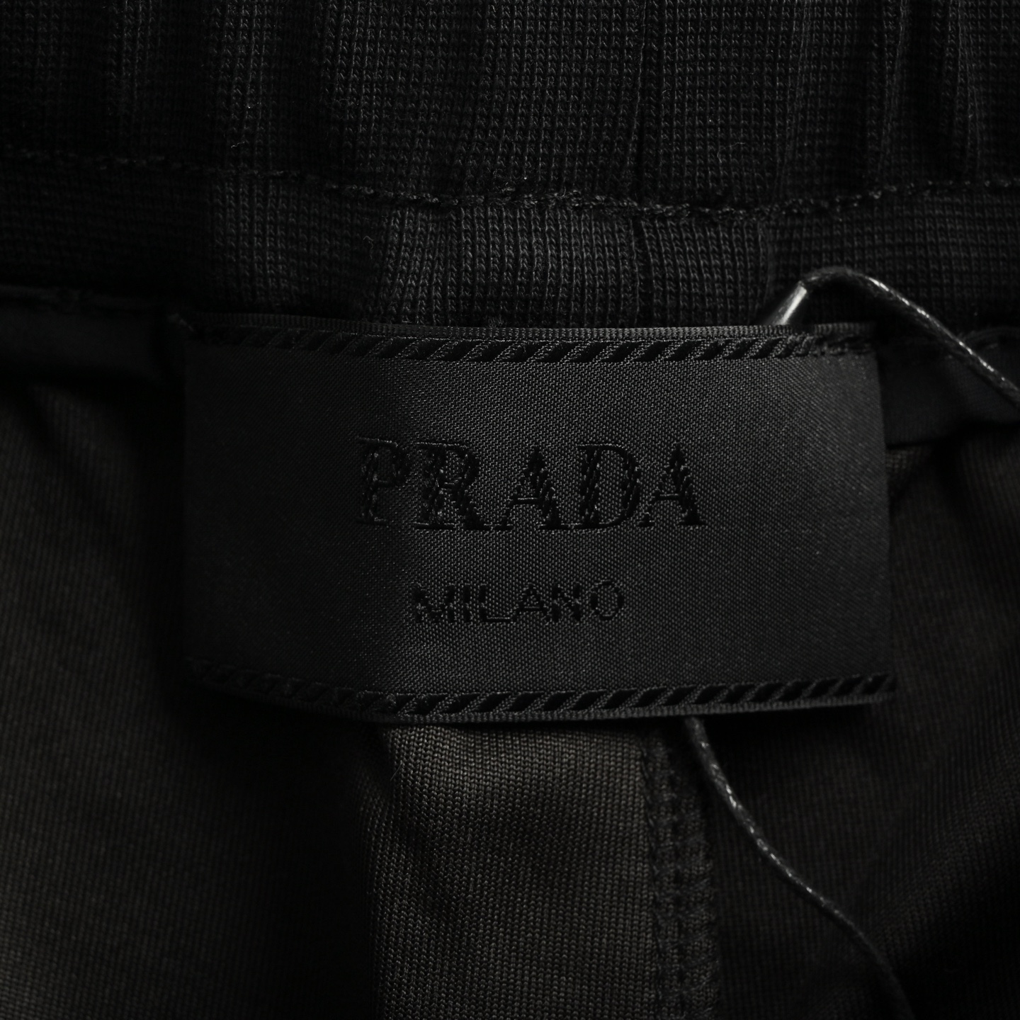 Prada 25ss triangle hem nylon patchwork pocket shorts