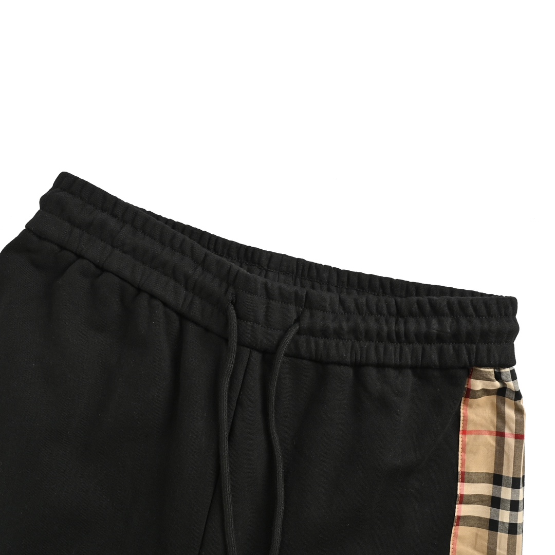 Burberry side-embossed logo check trousers