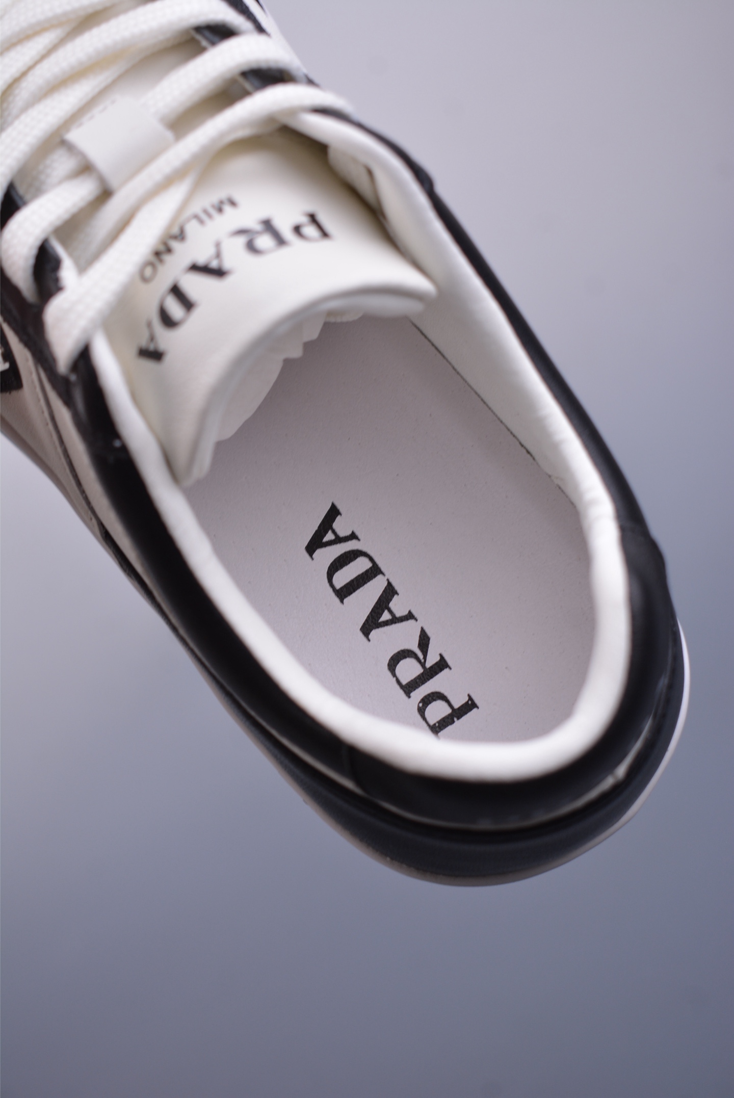 Prada low-top sneakers black and white COGNAC