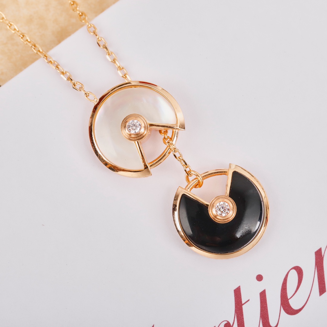 Cartier long chain amulet necklace