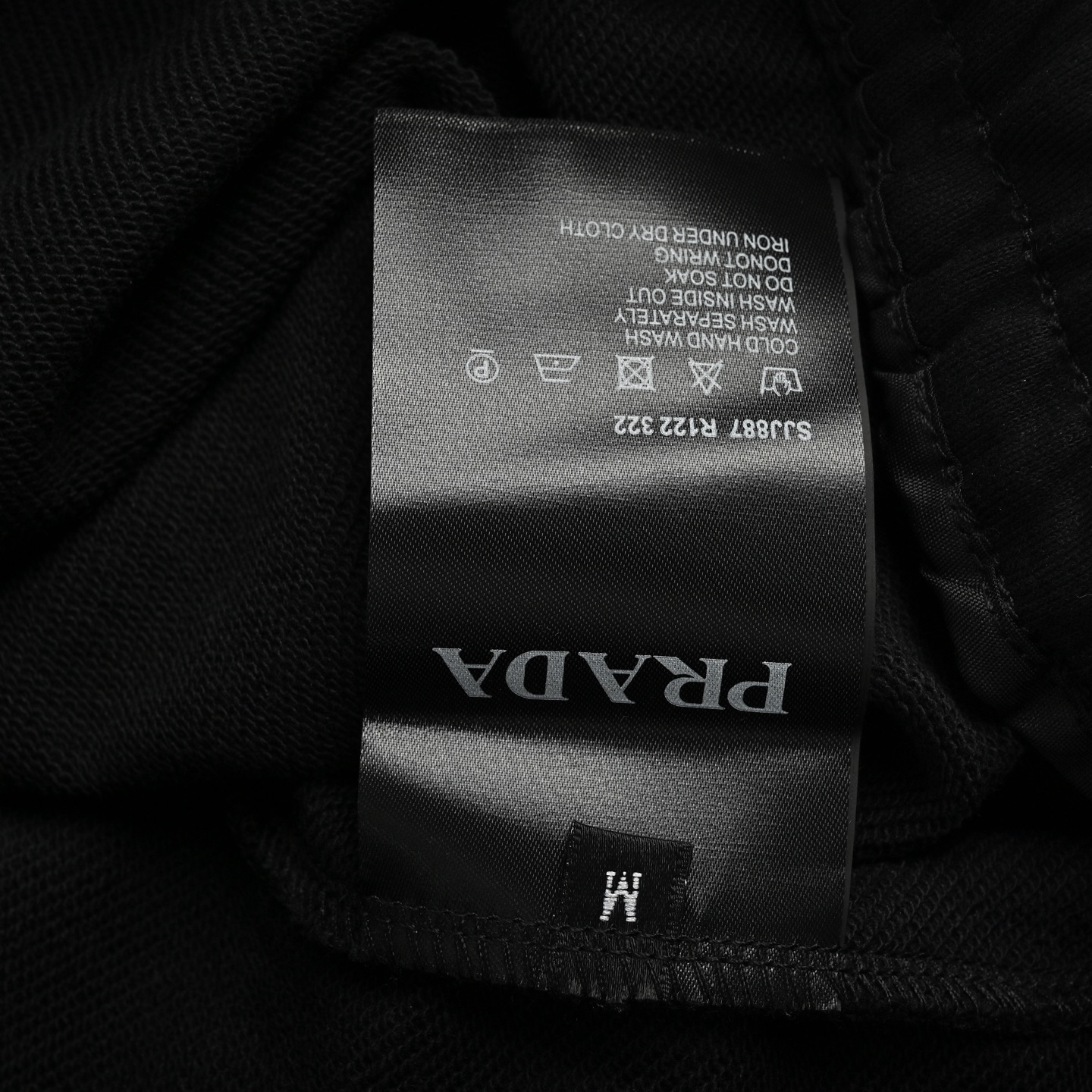 Prada triangle logo red rubber shorts