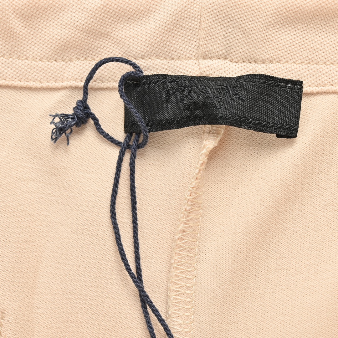 Prada 24ss apricot triangle logo shorts