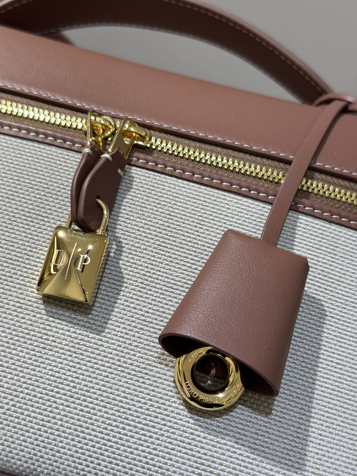 Loro Piana Extra series handbags