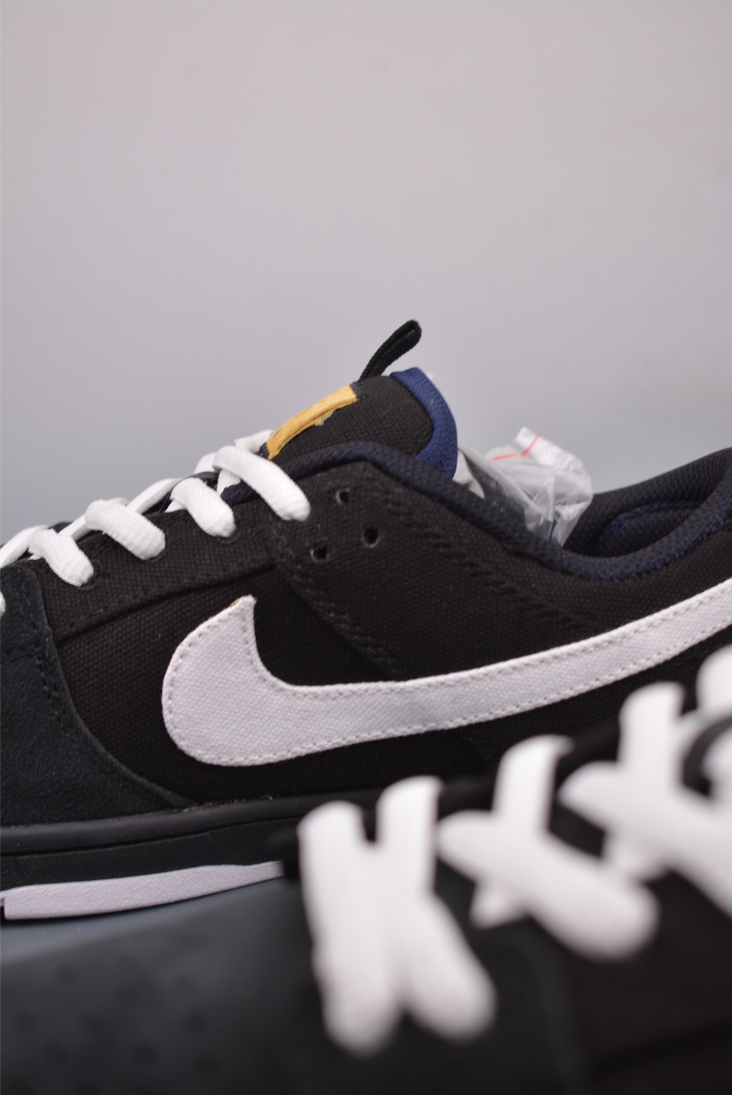 Nike SB Dunk Low Retro Sneakers Black and White DX6775-400
