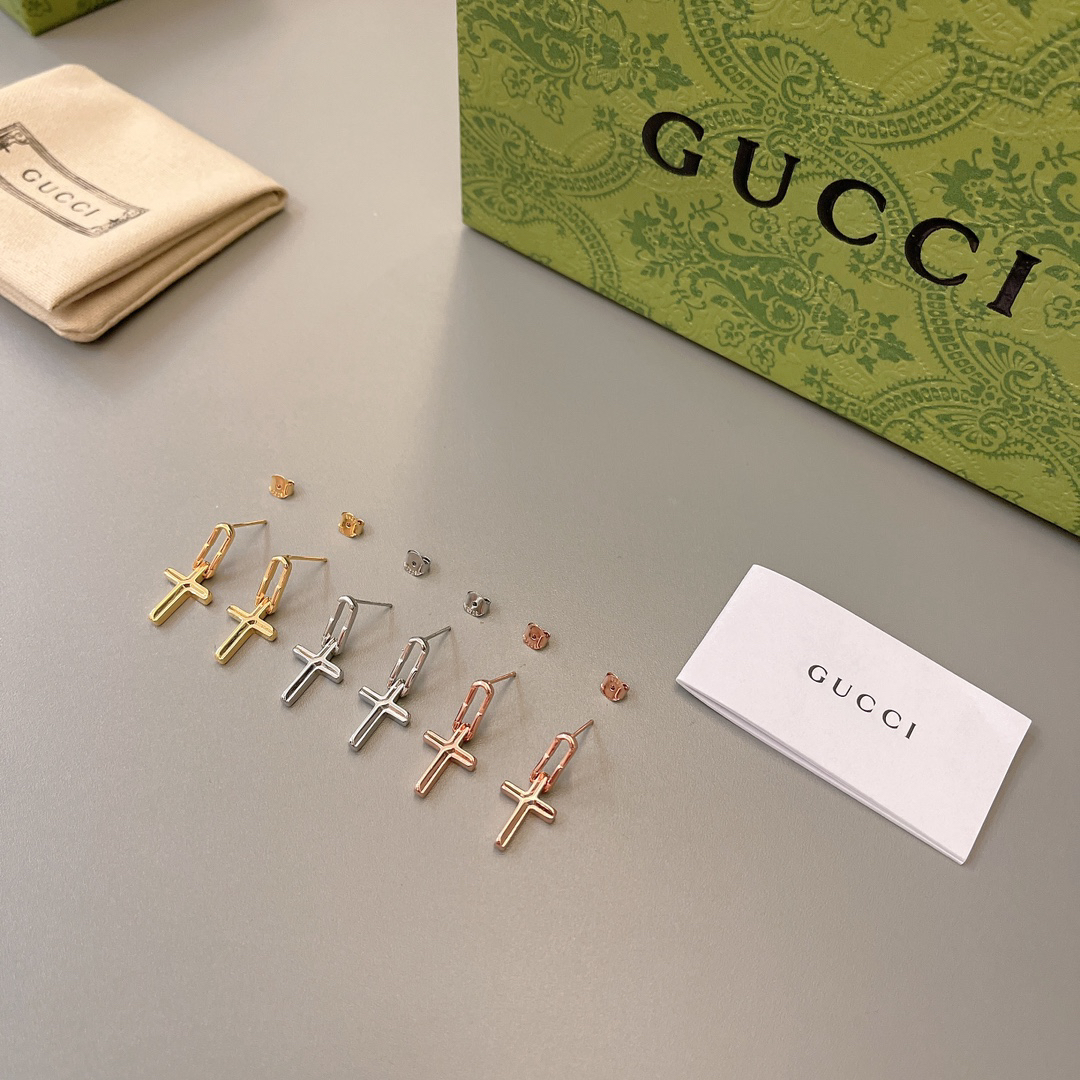 GUCCi cross earrings