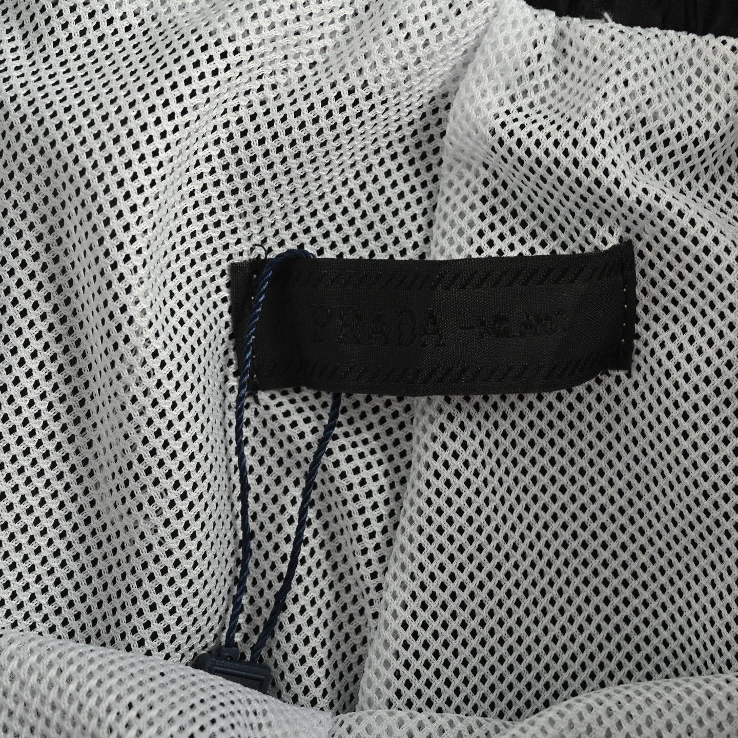 Prada 25ss all-over logo beach shorts
