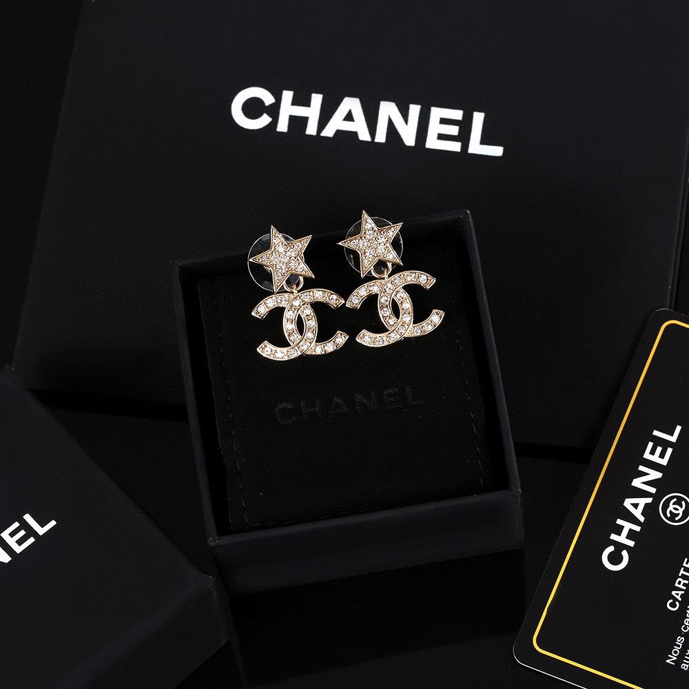 Chanel light gold diamond star earrings