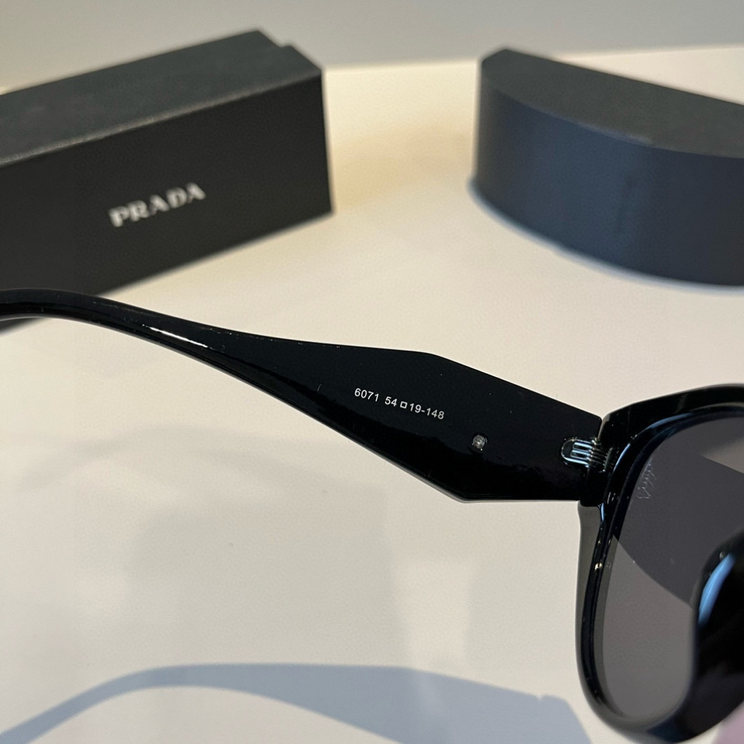 Prada round frame sunglasses