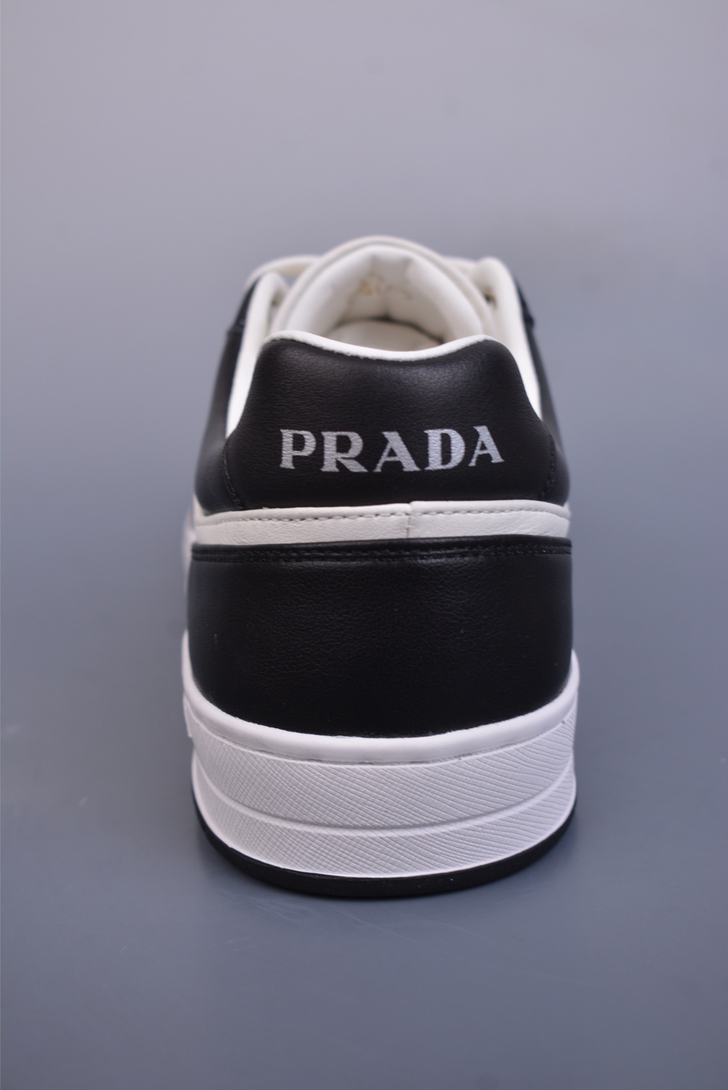 Prada low-top sneakers black and white COGNAC