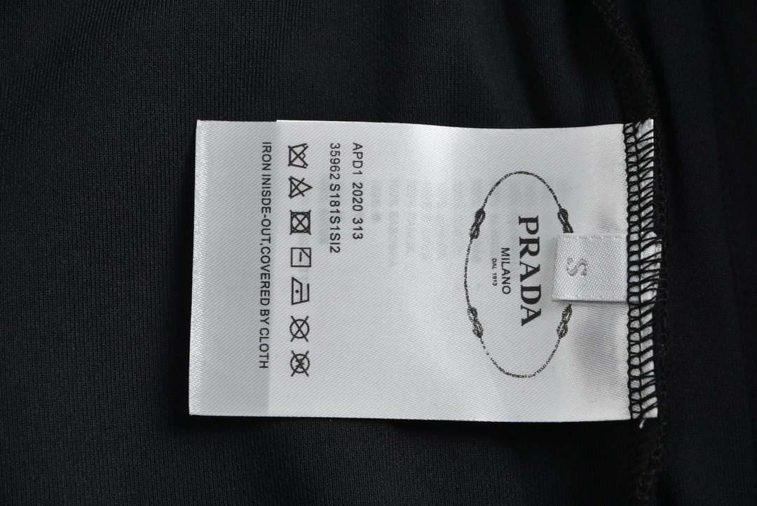 Prada 23Fw triangle logo patchwork suit trousers