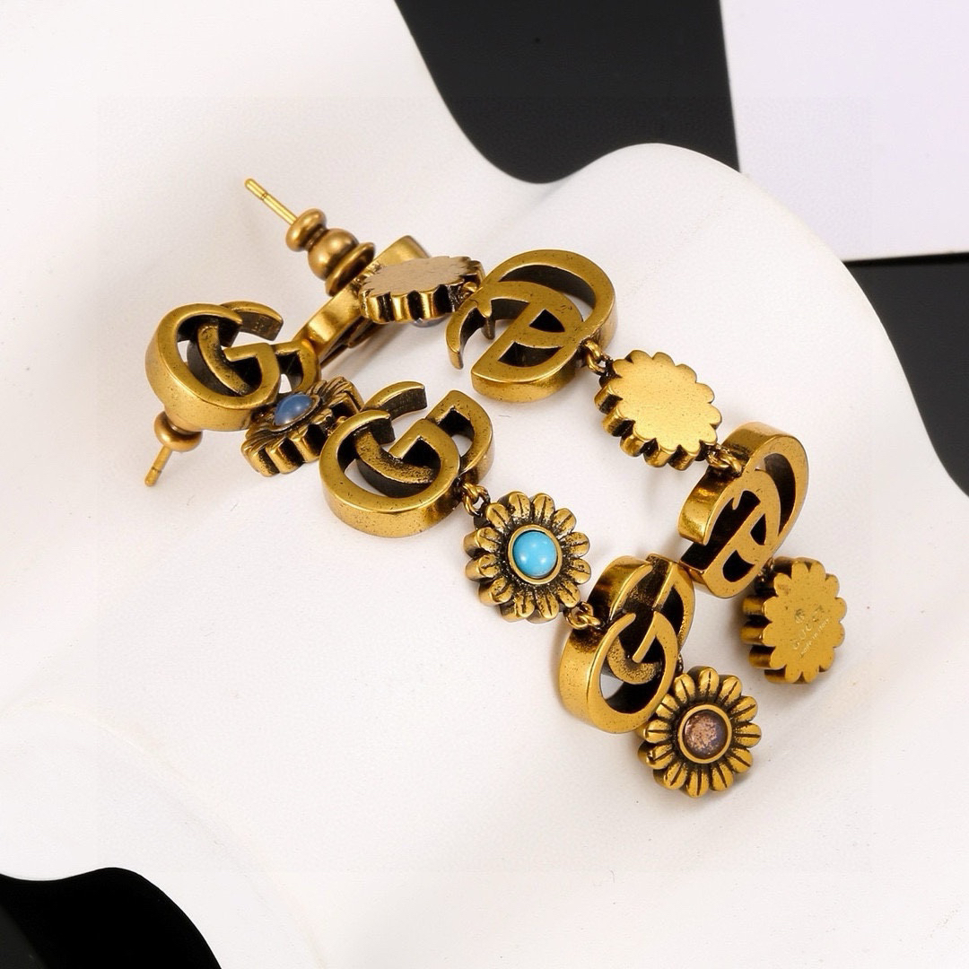 GUCCi distressed chrysanthemum earrings