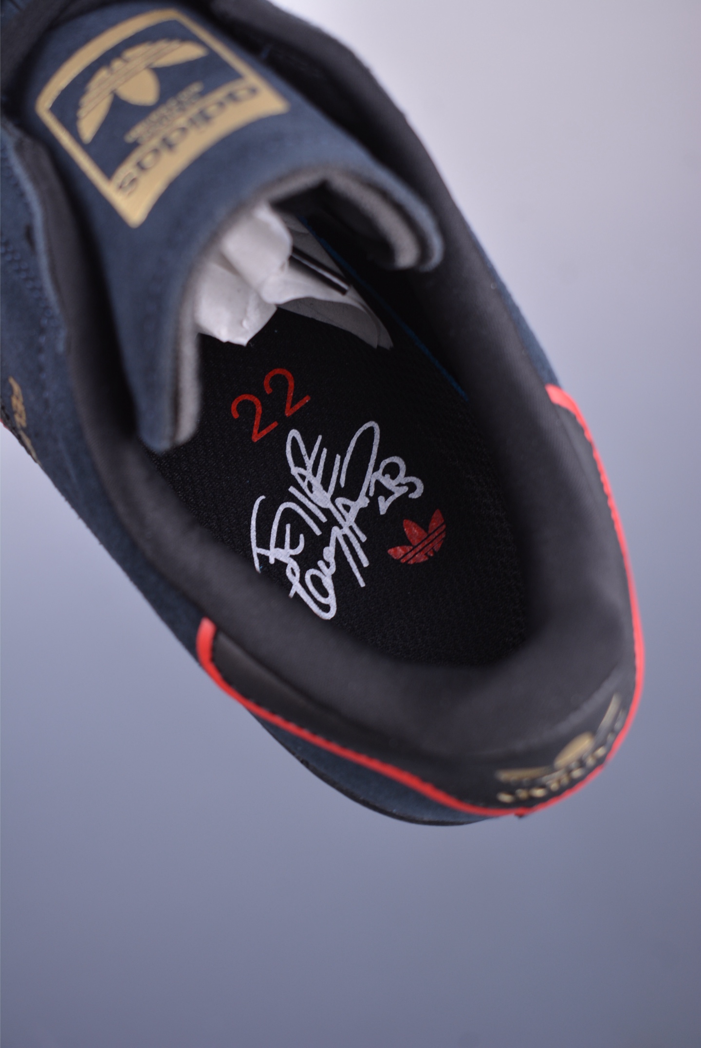 Felipe Gustavo x Adidas Superstar ADV sports shoes black, red and gold JR7831