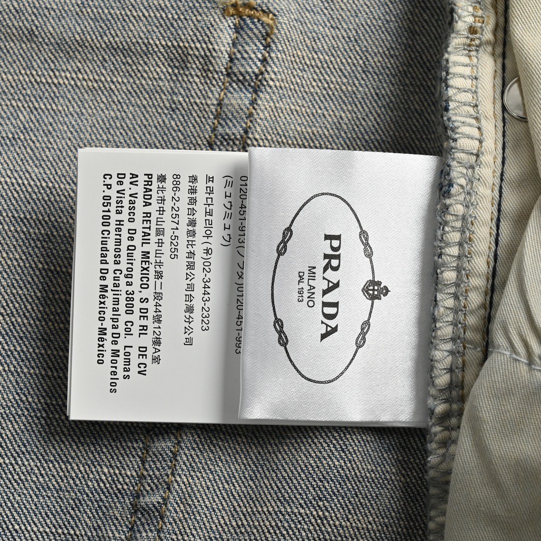 Prada 23Fw triangle back jeans