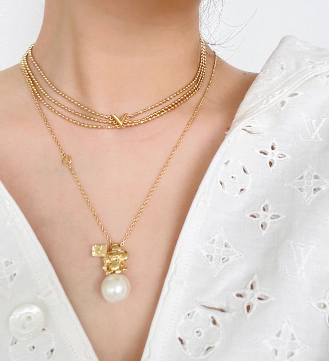 Louis Vuitton triple bead necklace