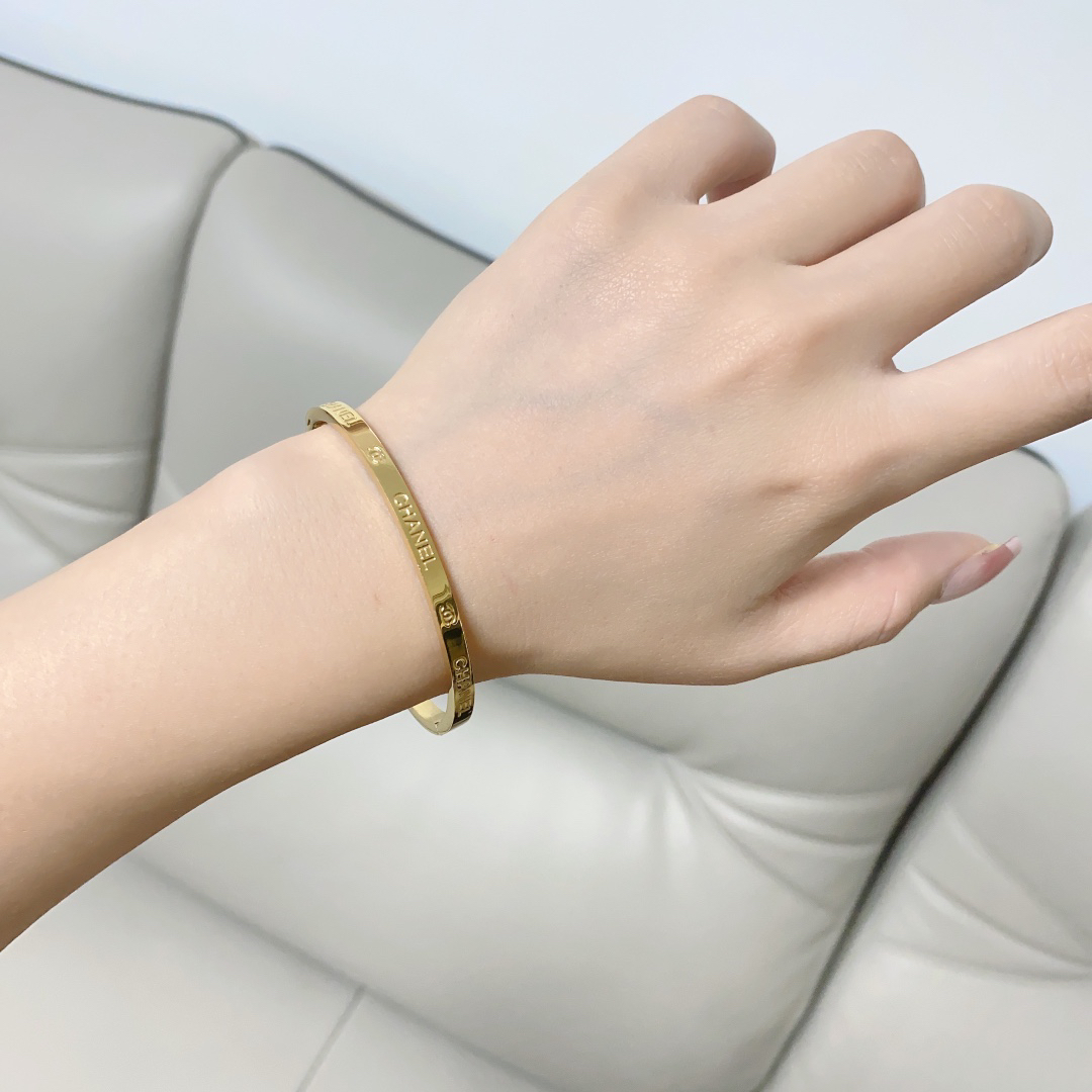 Chanel narrow engraved letter bracelet