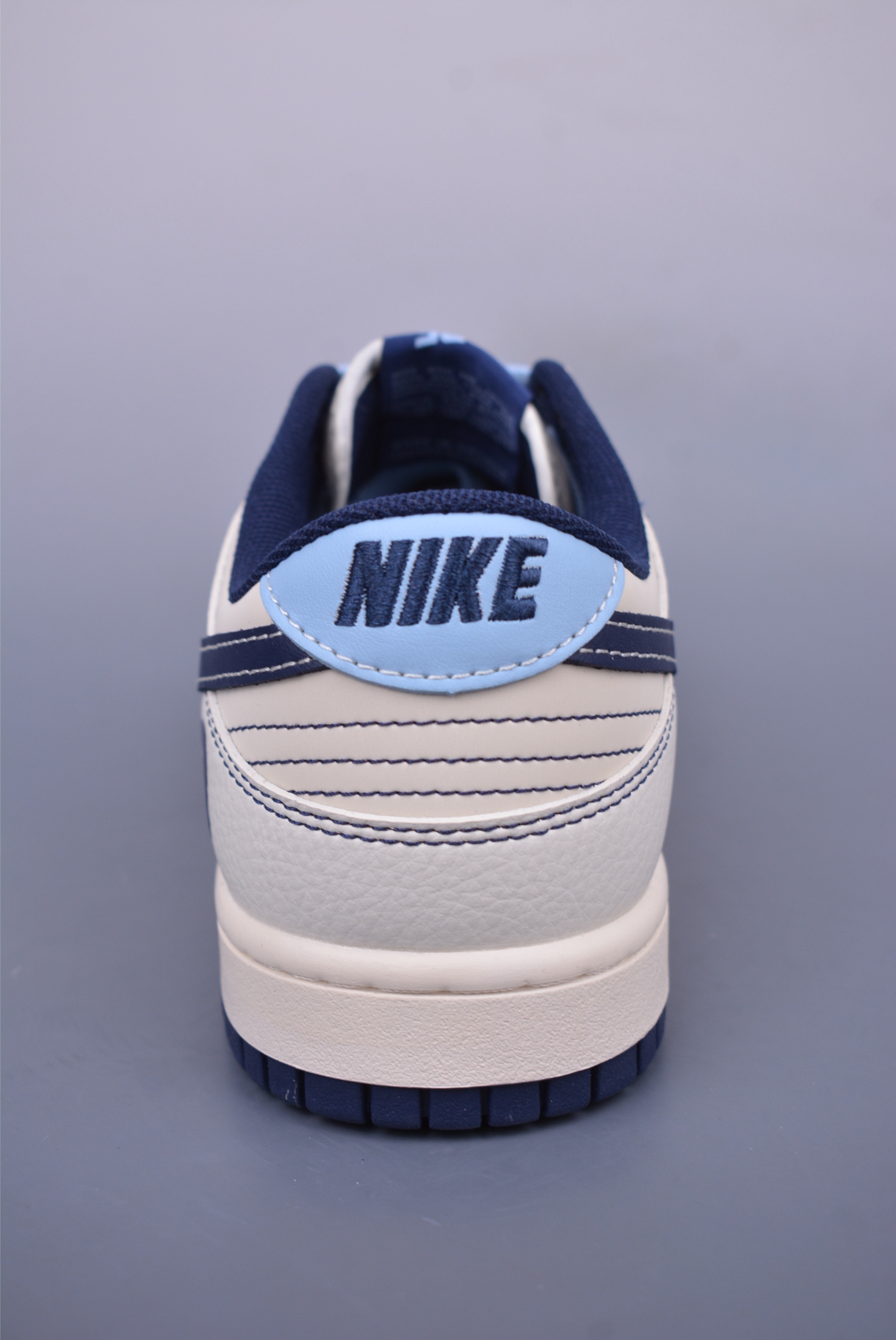 BAPE x Nike SB Dunk Low Low-top Sneakers Off-White and Black BZ2501-100