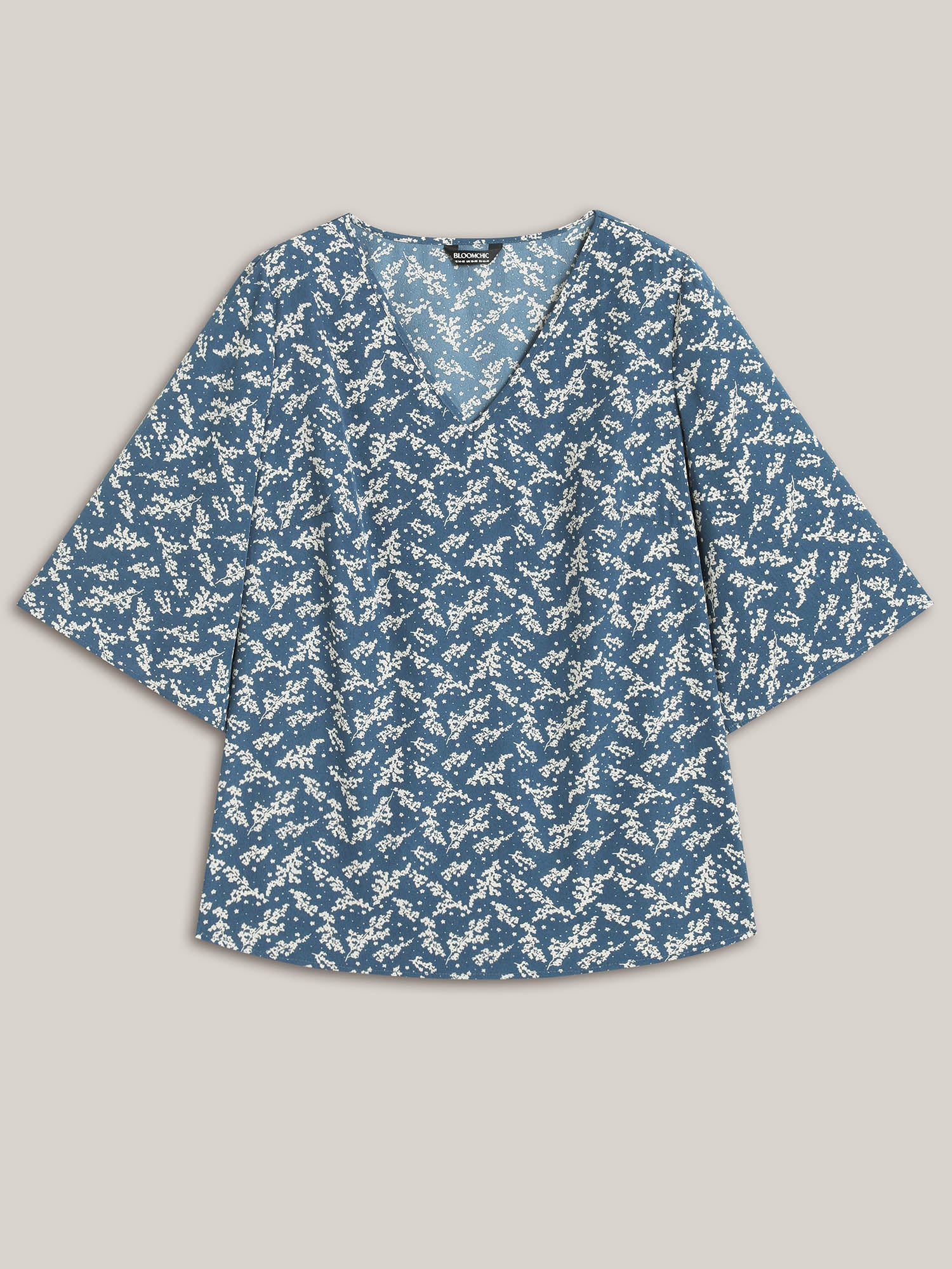 Floral Print Curvy Hem V-Neck Shirt