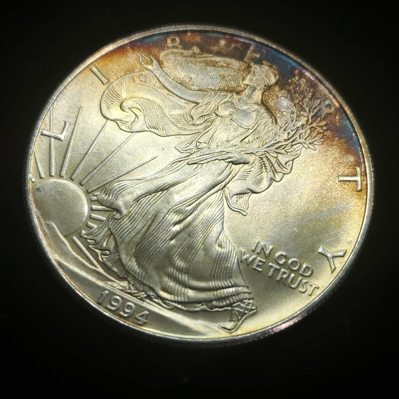 1994   American Silver Eagle  - Toned    -  1 Oz .999 Tough  Key date   Lot# 522 Regular 79