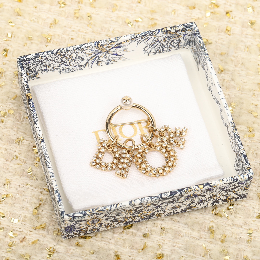 Dior diamond letter brooch