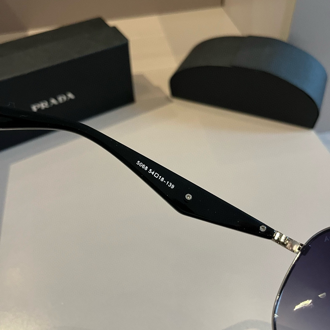 Prada round frame sunglasses