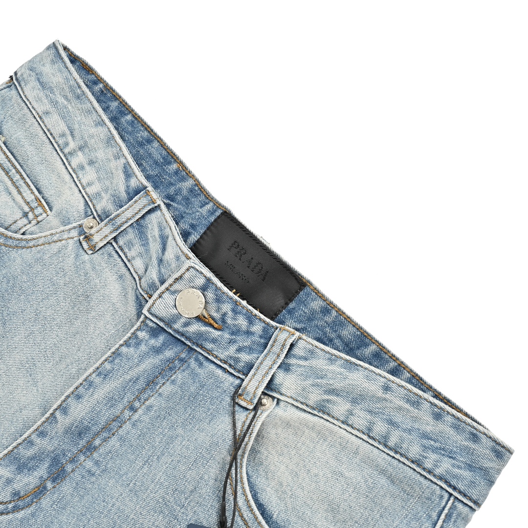 Prada washed jeans with embossed logo on back pocket