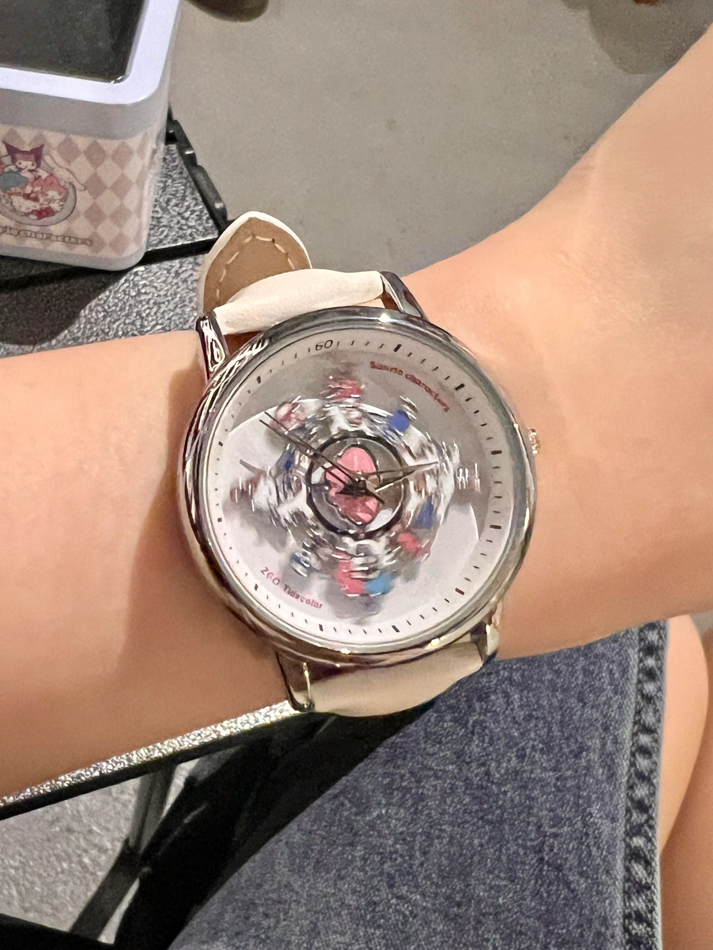 Sanrio Women Carousel Turntable Watch Gift Box | Casual Ladies Wristwatch Silver-Tone Case with White Fabric Strap (36mm)