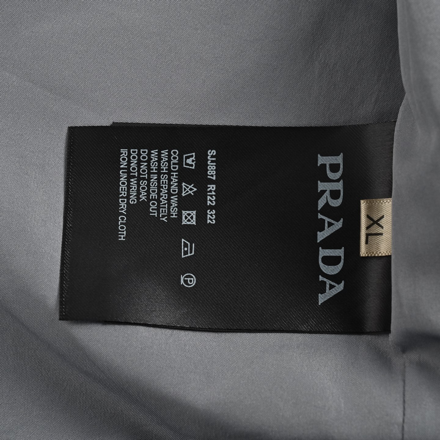 Prada 25ss metal triangle logo laminated zipper jacket