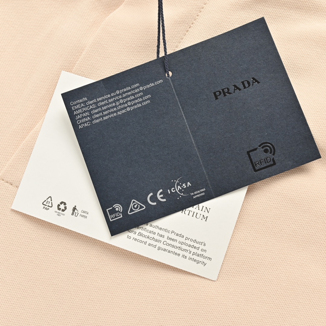 Prada 24ss apricot triangle logo shorts