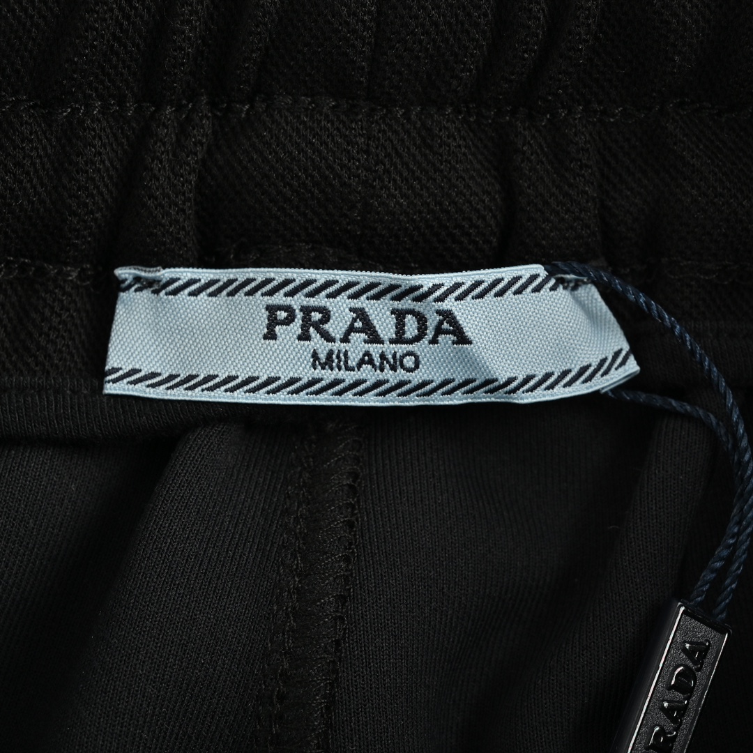 Prada 24Fw knee pocket metal triangle logo cuff trousers