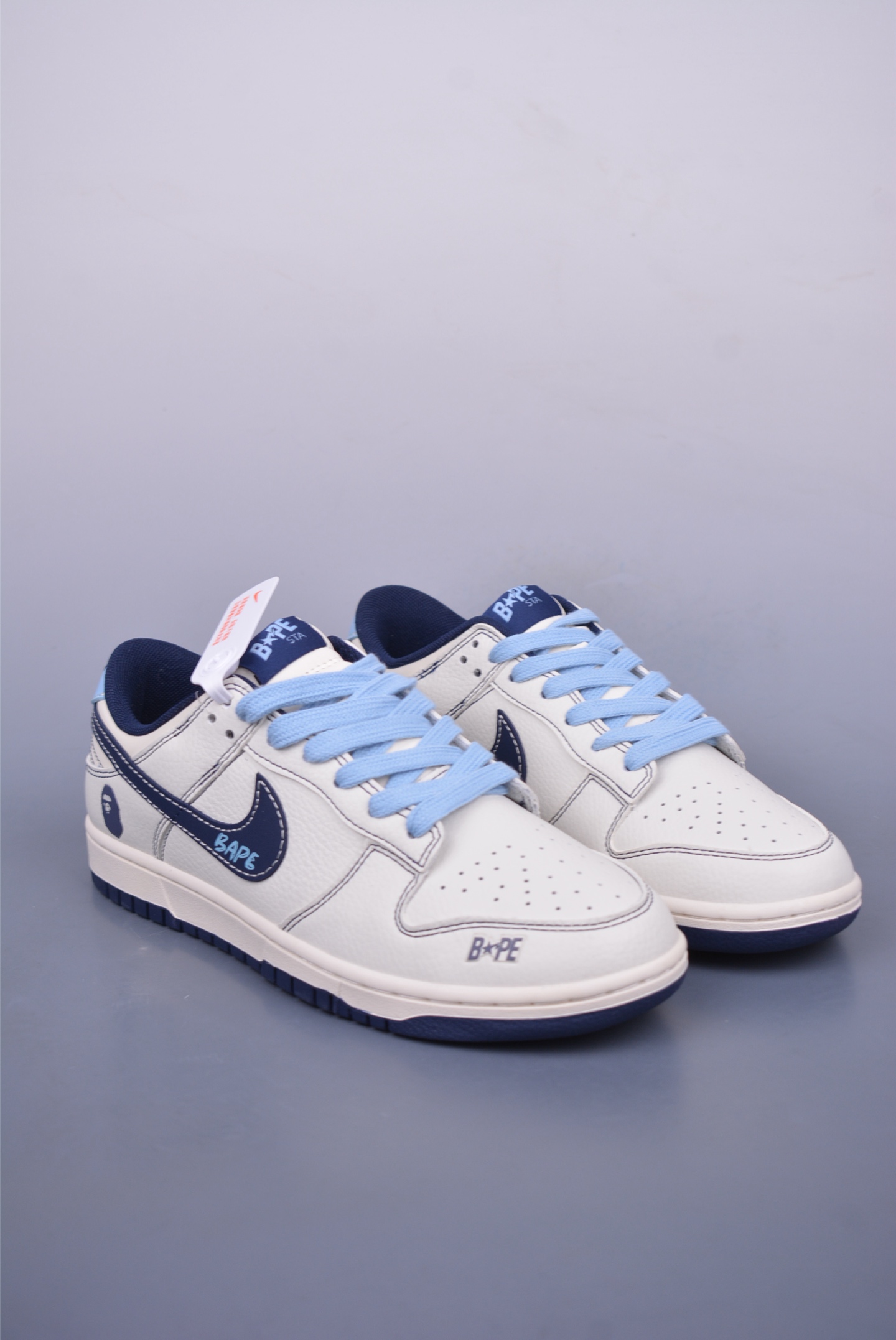 BAPE x Nike SB Dunk Low Low-top Sneakers Off-White and Black BZ2501-100