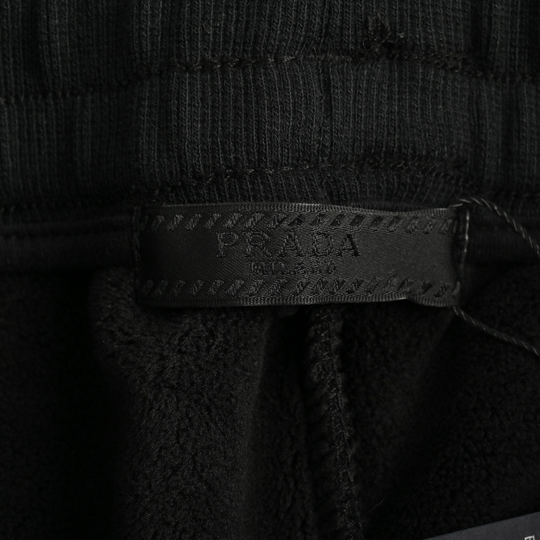 Prada 24Fw front and back logo embroidered fleece trousers